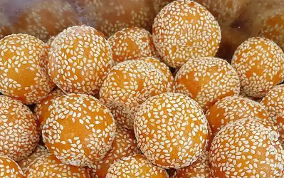 炸煎堆家庭版制作方法，节日餐桌的吉祥小吃